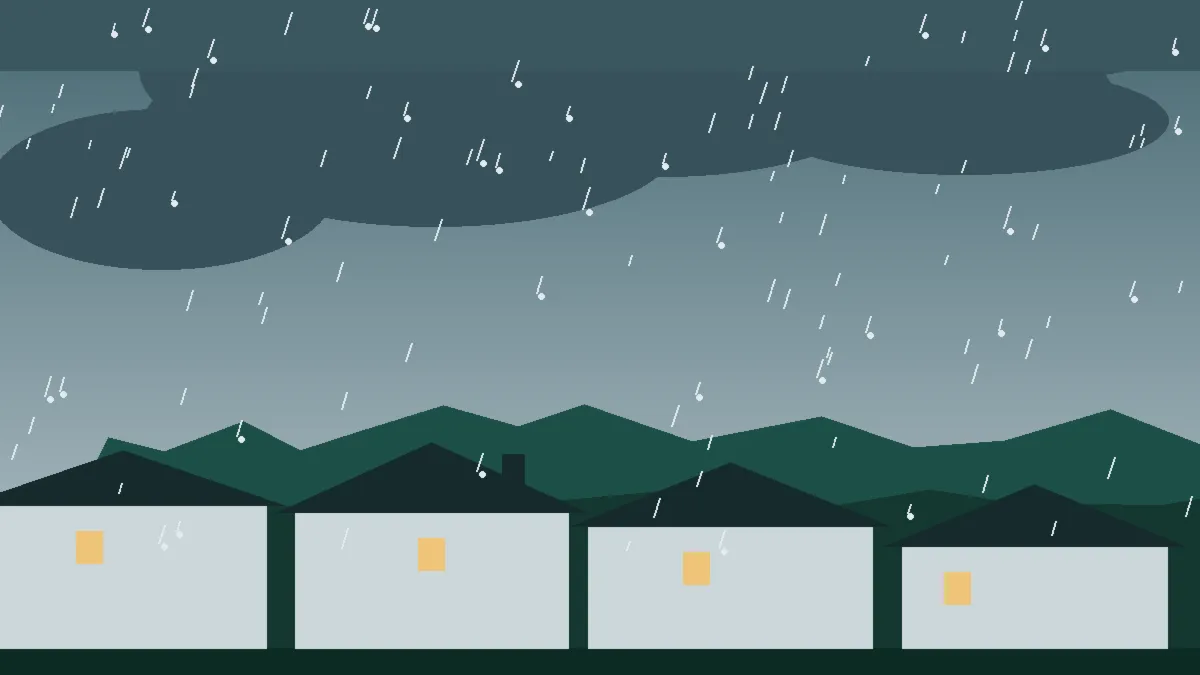 Hail Damage Roof Repair & Replacement Palisade, CO — storm light over rooftops in Palisade, Colorado